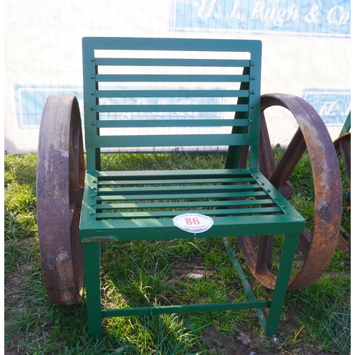 86 - Single seat bench with old cast iron wheels