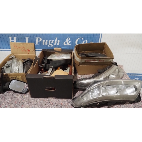 28 - Quantity of assorted car light and mirrors to include Renault Laguna and Fiat Punto