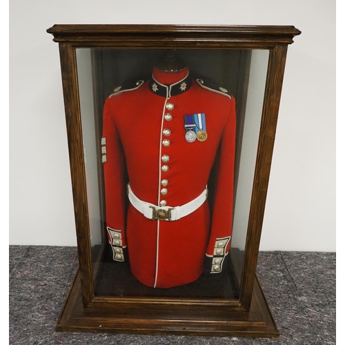 388 - Coldstream guards tunic in fitted display case, Northern Ireland medals all relating to Sergeant Maj... 