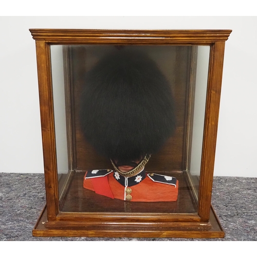 389 - Coldstream guards bearskin, circa 1980 on mannequin in fitted case