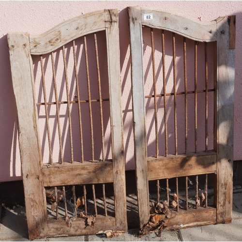 82 - Pair of wood and metal gates 19