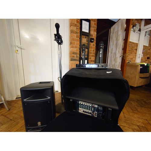 124 - Yamaha Stagepas 300 portable PA system with 3 microphones.