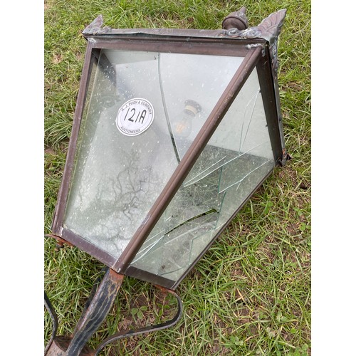 121A - Cast iron lamp post with copper top. Working when removed. 14ft. Glass smashed on 3 panels