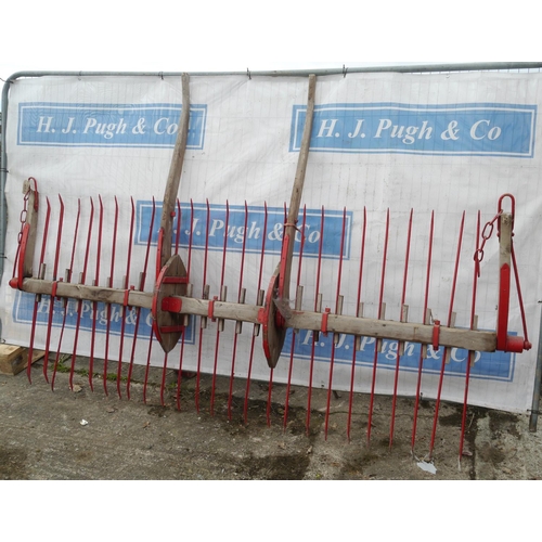 Horse drawn turnover hay rake