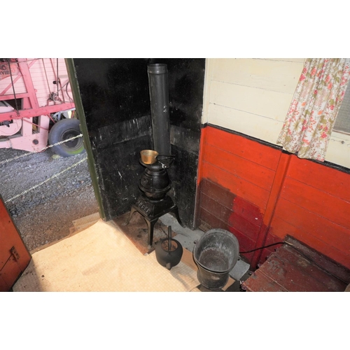 270 - Millmans hut, complete & original c/w stove