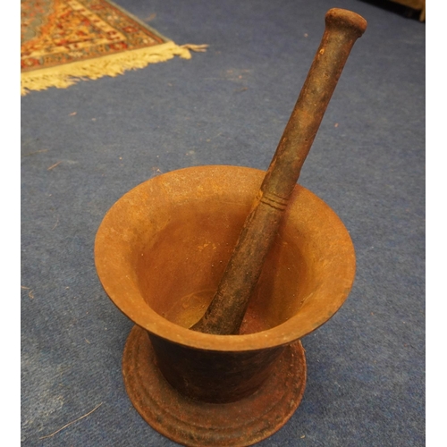 353 - Cast iron pestle and mortar