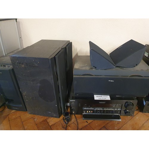 125C - 4- CD changers, amps and speakers to include cinema amp and surround sound