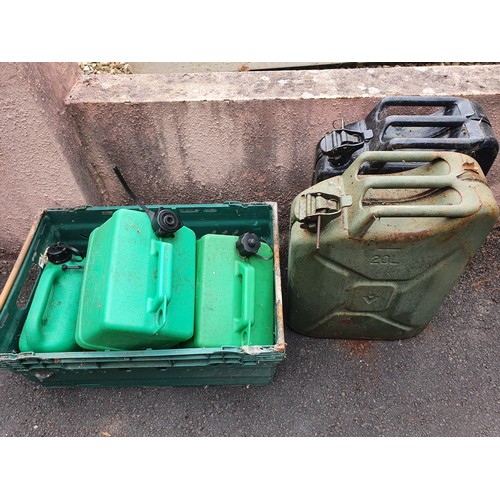 96 - 2- Jerry cans and assorted fuel cans