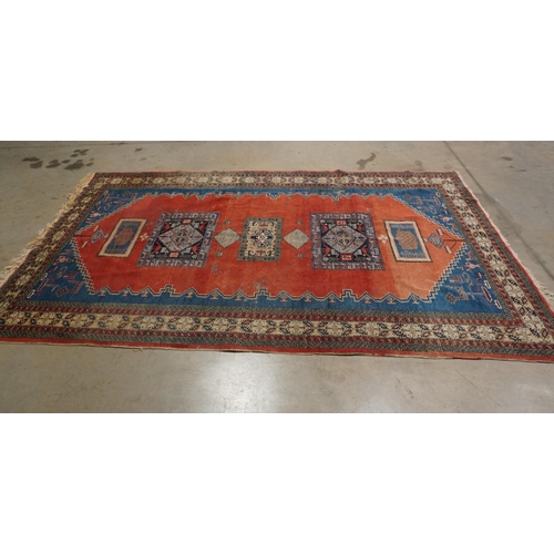 239 - Red and blue patterned hall rug 128x77