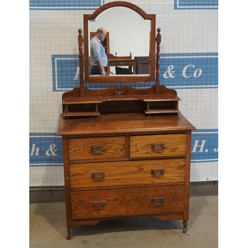 167 - Oak dressing chest of 2 short, 2 long drawers with bevel edged mirror 63x36