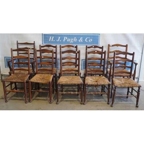 45 - Set of 10 harlequin ladderback chairs to include 2 carvers