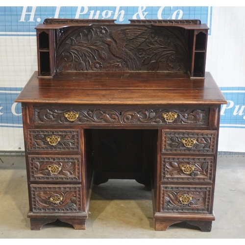 39 - Carved oak, twin pedestal desk 42x41
