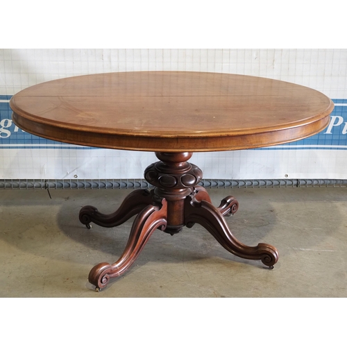 131 - Mahogany oval dining table on pedestal base 54x38