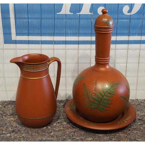 288 - Watcombe pottery lidded terracotta flask and saucer and Watcombe jug