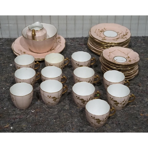 314 - Pink china tea service with gold floral pattern