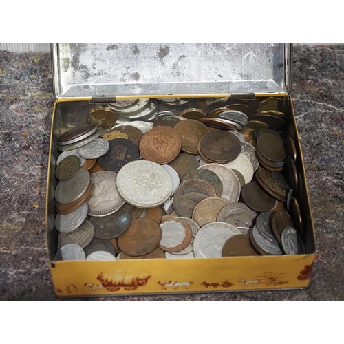 323 - Tin of assorted coins