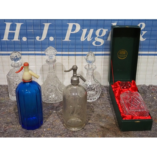 519 - Cut glass decanters and soda syphons