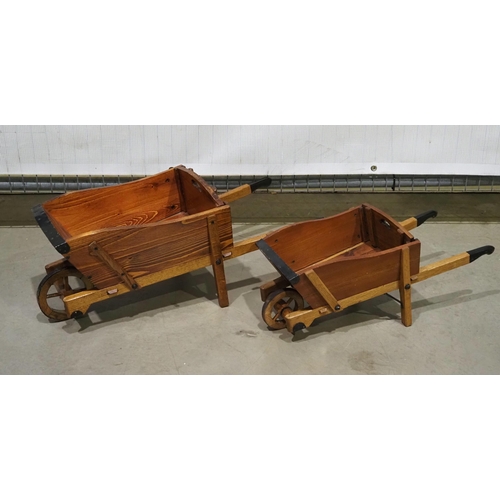 578 - 2 Ornamental wheelbarrows