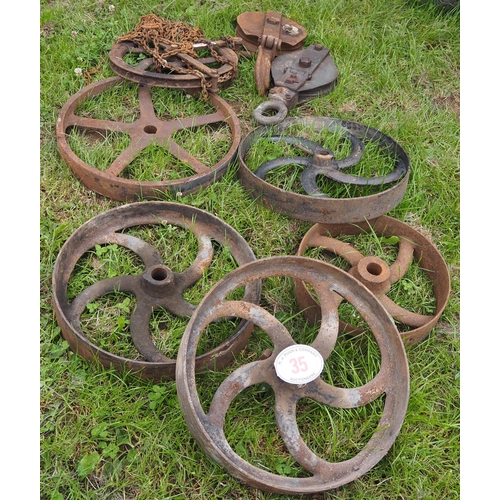 35 - Quantity of cast iron wheels and pulleys
