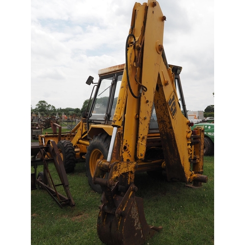 1987 - JCB 3CX-4 digger, back hoe, buckets and pallet tines. working H317 EAY