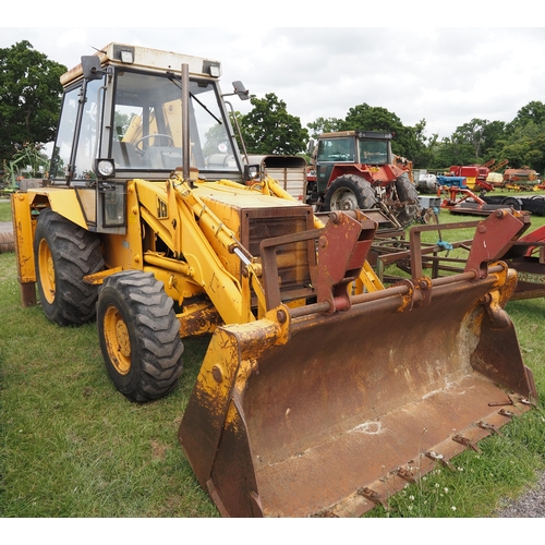 1987 - JCB 3CX-4 digger, back hoe, buckets and pallet tines. working H317 EAY