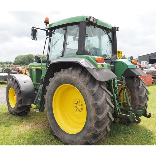 2068 - John Deere 6610 4wd tractor. 521 UVJ. 11689 hours recorded. Service record, tidy, off farm, A/C, air... 