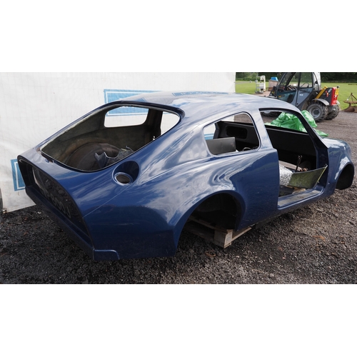 404 - Markos Mini special  fibreglass bodyshell. 1971. Comes with some extra parts. Tank not included. Bod... 