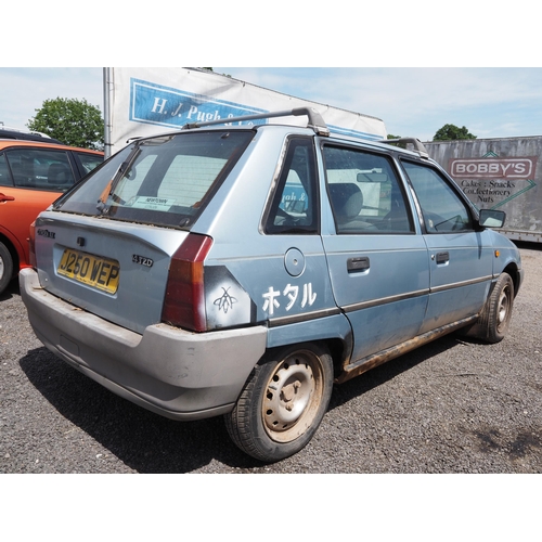 431 - Citroen AX 14 TZD, 1.4L diesel, 1992. Starts, runs and rides. Reg. J250 WEP. V5 and keys