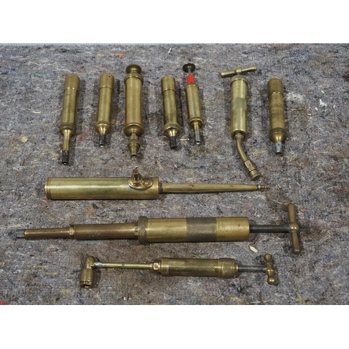 134 - 8- Brass grease guns to include Enotts