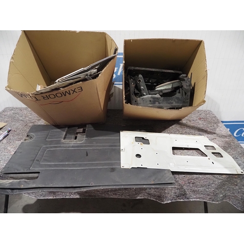 334 - Land Rover door cards, mirrors, instrument panels, etc.