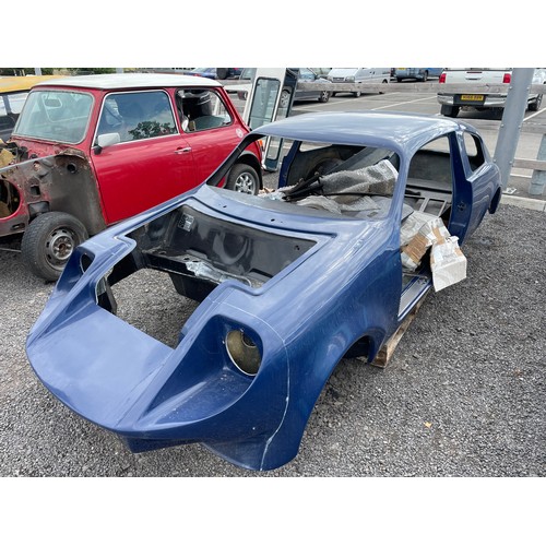 404 - Markos Mini special  fibreglass bodyshell. 1971. Comes with some extra parts. Tank not included. Bod... 