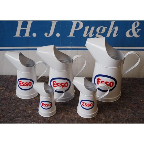 777 - 5- Oil jugs with Esso logo