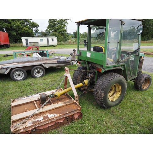 1194 - John Deere 755 Compact tractor and topper. Runs. Key in office