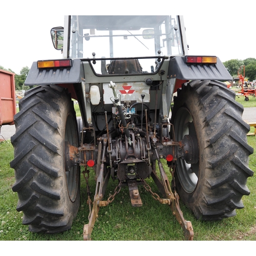 1297 - Massey Ferguson 398 tractor. 2WD. Quicke 520 loader. 7230 hours, full service, off farm. Runs and dr... 