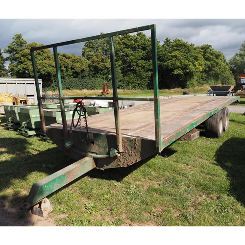 1560 - Merrick Logging bale trailer. 28ft. Oil brakes