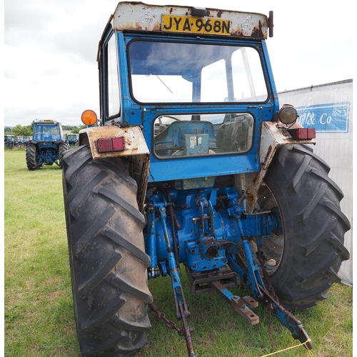 323 - Ford 7000 tractor. 1975. With Fieco cab. Runs and drives. Owned by the same owner since 1990 in Glou... 