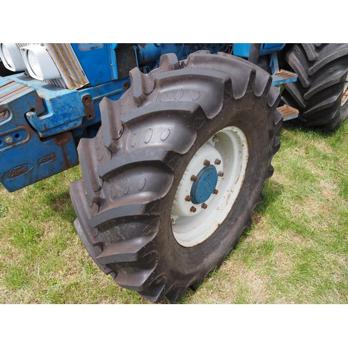 338 - Ford 7810 tractor. 1989. Runs. 7821 hours recorded. 4WD. Good all round tyres. C/w front weights and... 
