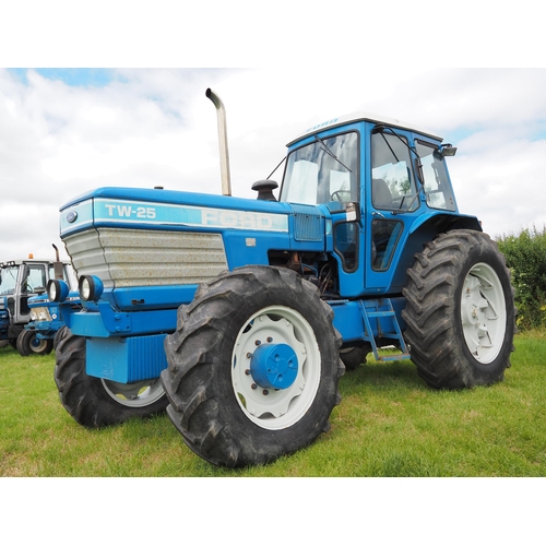 343 - Ford TW-25 tractor. 1983. 4WD. Runs. 7957 hours recorded. C/w underslung front weights, PAVT wheels ... 