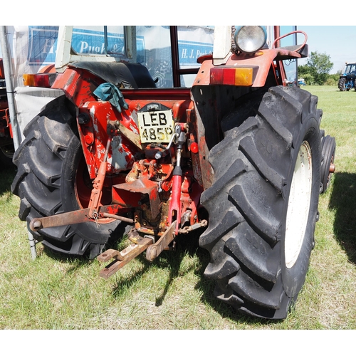 365 - International 454 tractor. 1976. 4853 hours recorded. Inner and outer wheel weights. Running well. R... 