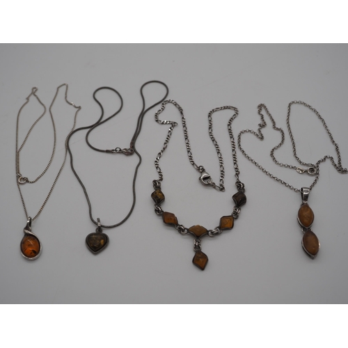 311 - 4- Silver amber pendants on silver chains