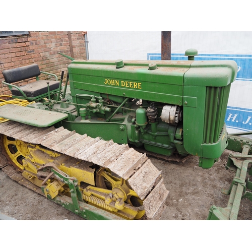 149 - John Deere 40C petrol crawler. Electric start  c/w front blade and drawbar. Runs and drives.  SN-645... 