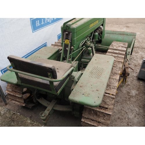 149 - John Deere 40C petrol crawler. Electric start  c/w front blade and drawbar. Runs and drives.  SN-645... 