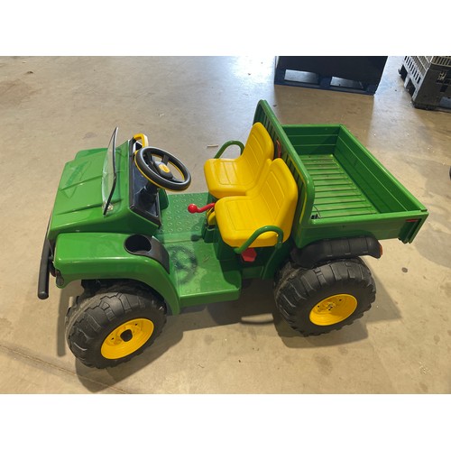 562 - John Deere electric ride on gator. Runs