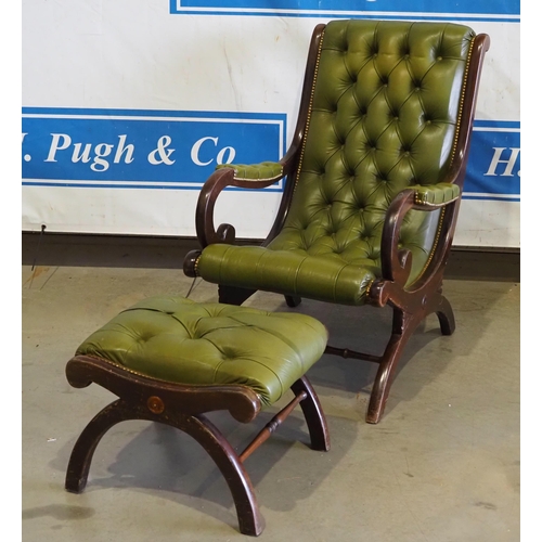 82 - Green leather armchair and stool