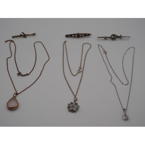 287 - 3- Silver pendants on silver chains and 3 bar brooches