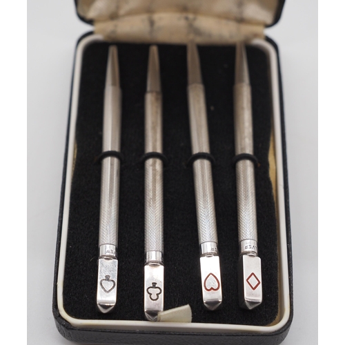 316 - Cased set of 4 silver bridge markers