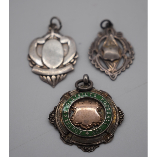 320 - 3- Hallmarked silver fobs, one with gold centre