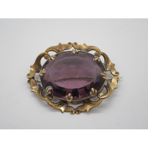 379 - Yellow metal amethyst brooch