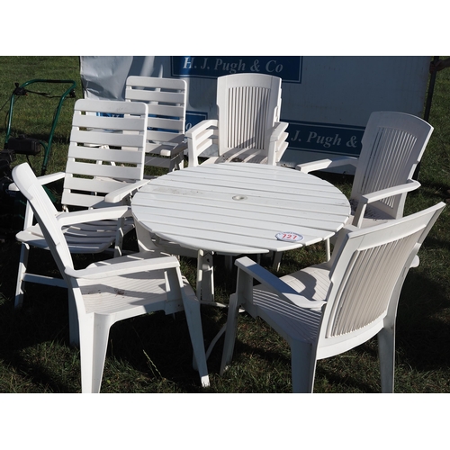 727 - Plastic garden table and chairs