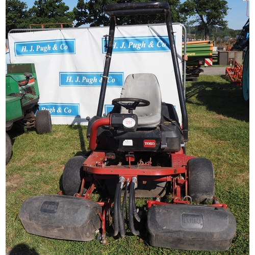 1291 - Toro Greensmaster 3250D. Runs and drives. Key in office